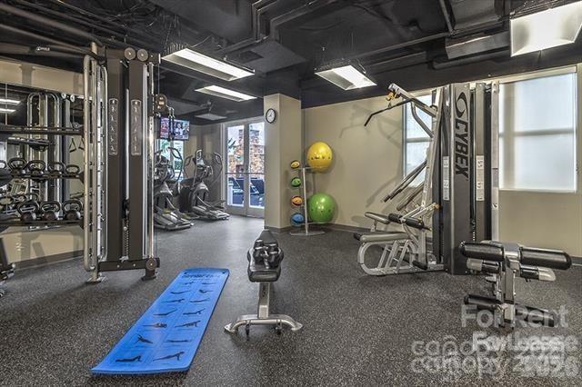909 Camden Grandview Road, Unit B6A Charlotte, NC 28202 - Photo 7 of 23 a view of a room with gym equipment