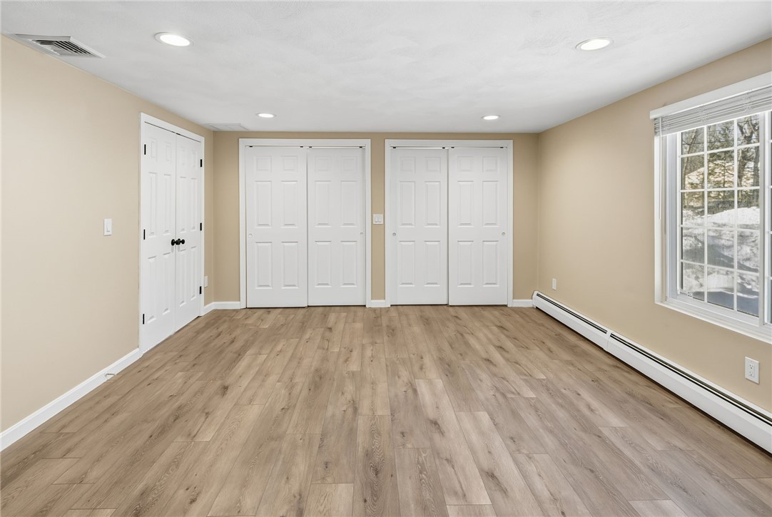 33 Eagle Run Warwick, RI 02818 - Photo 12 of 40 Family room or first floor primary bedroom