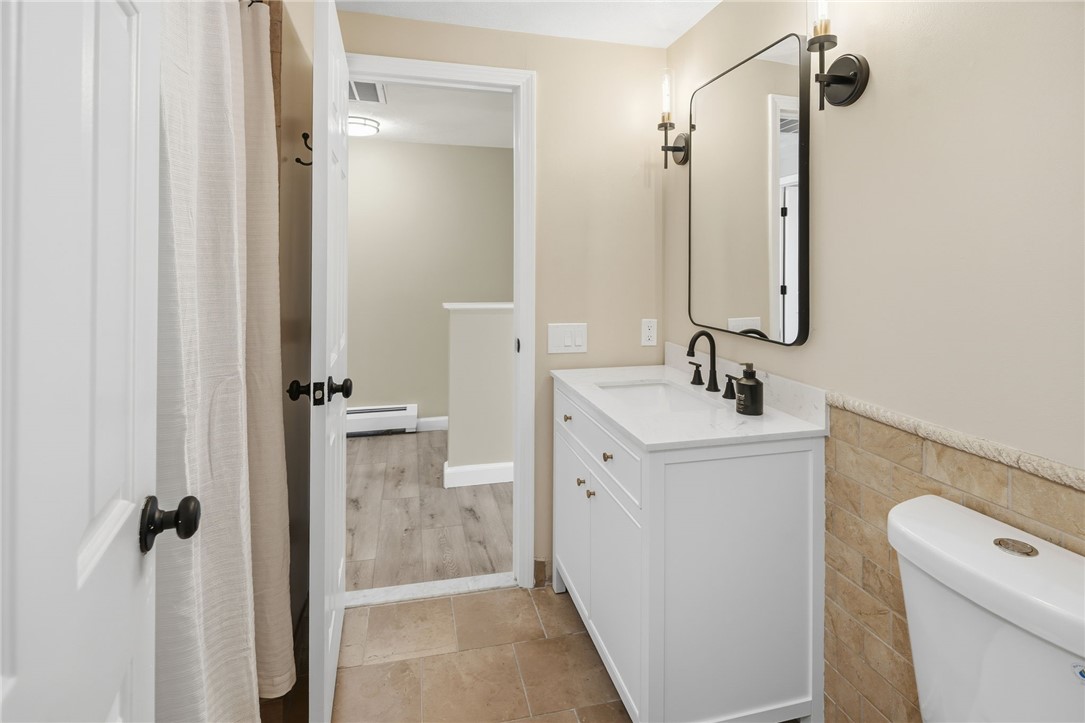 33 Eagle Run Warwick, RI 02818 - Photo 23 of 40 New vanity, toilet, paint, fixtures