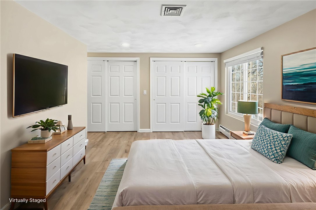 33 Eagle Run Warwick, RI 02818 - Photo 24 of 40 Virtually staged primary bedroom with double closets