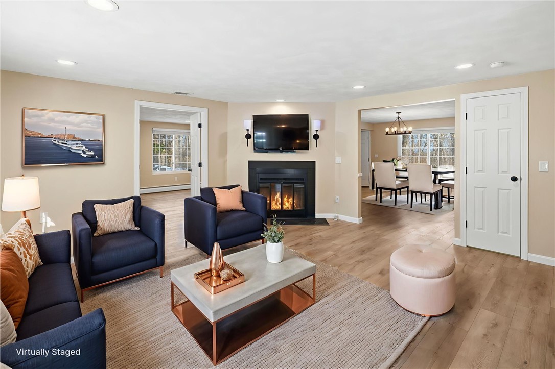 33 Eagle Run Warwick, RI 02818 - Photo 5 of 40 Virtually staged, warm and welcoming living room