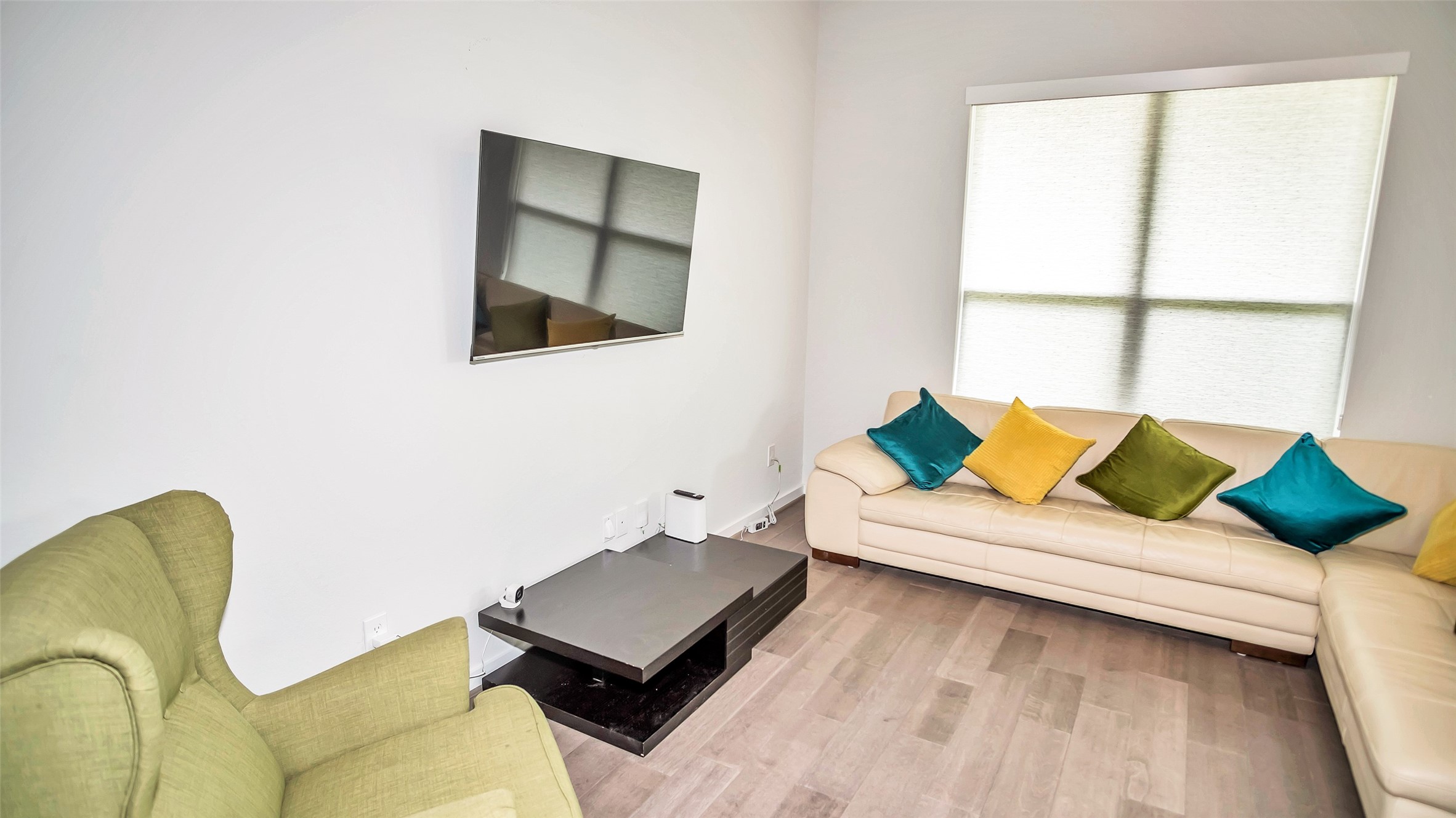 1919 Pueblo Nuevo Path Houston, TX 77077 - Photo 39 of 50 a living room with furniture rug and a window