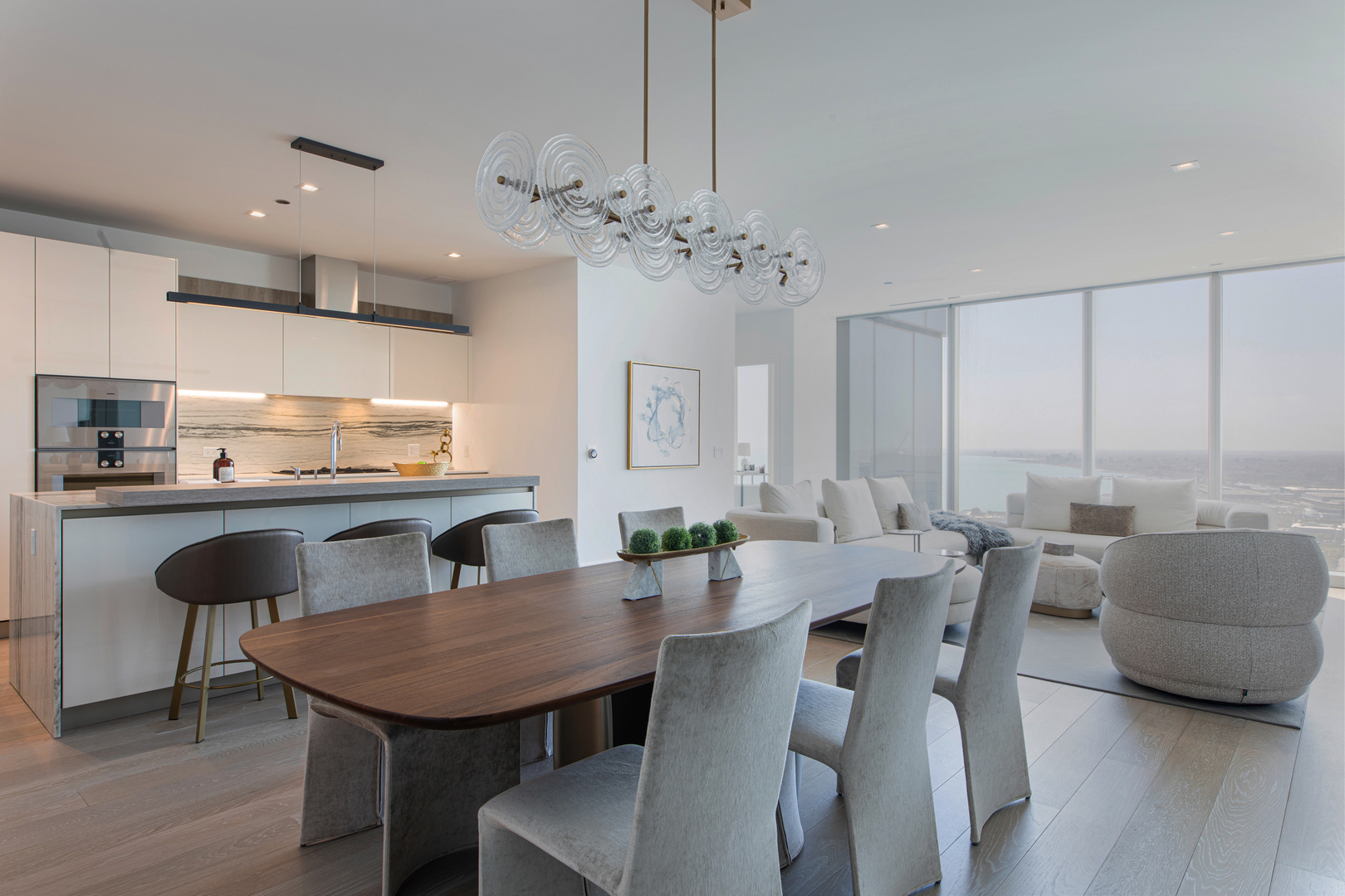 363 East Wacker Drive, Unit 6603 Chicago, IL 60601 - Photo 14 of 21 a view of a dining room with furniture and wooden floor