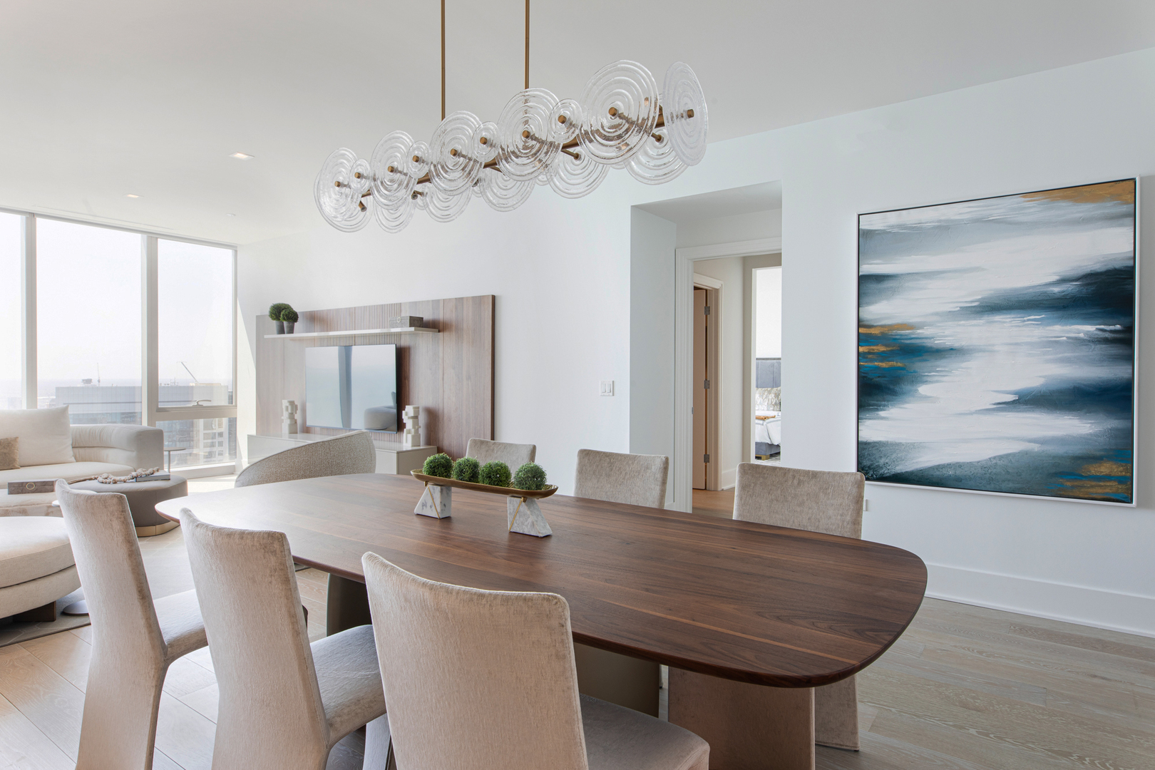 363 East Wacker Drive, Unit 6603 Chicago, IL 60601 - Photo 18 of 21 a view of a dining room with furniture wooden floor and chandelier