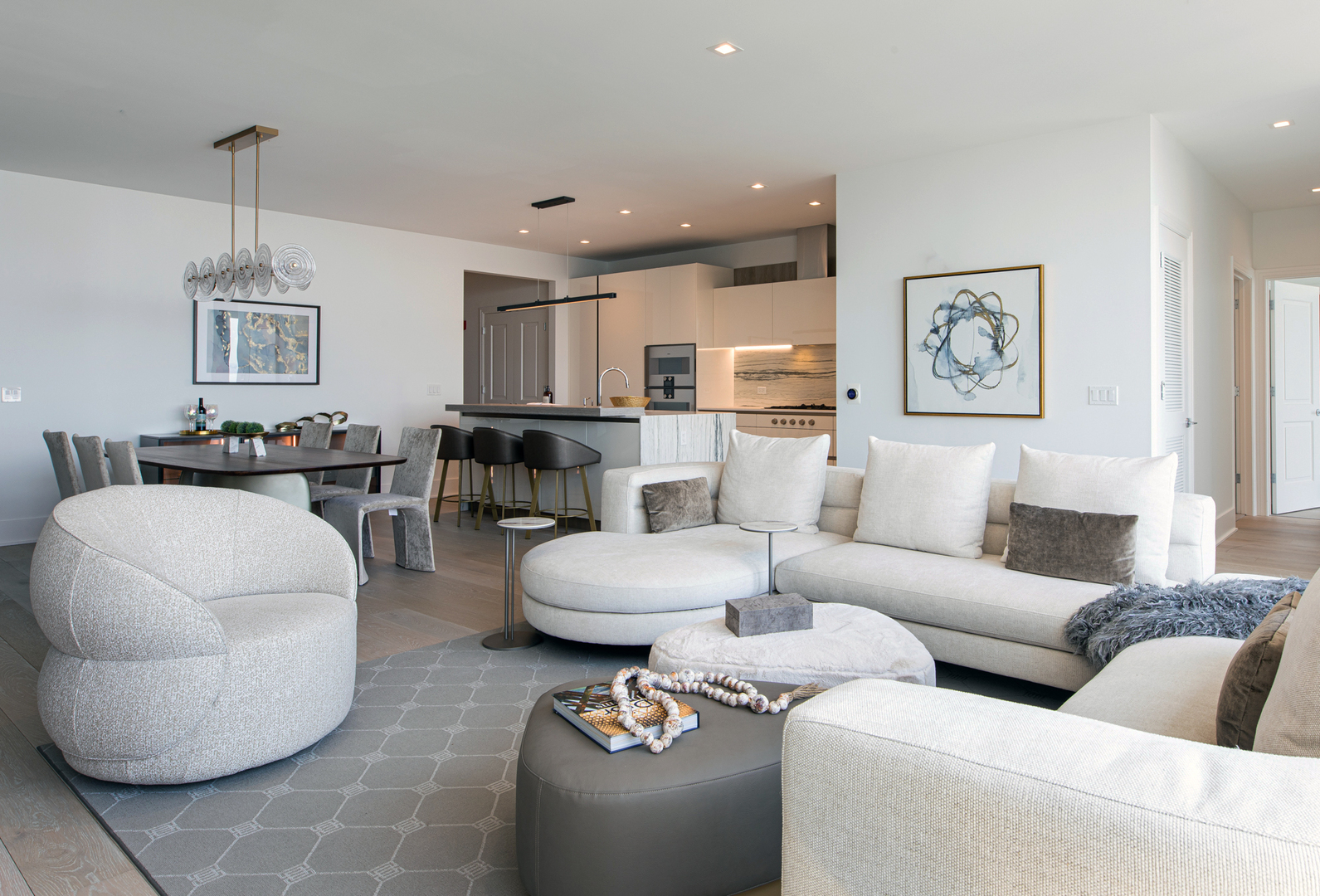 363 East Wacker Drive, Unit 6603 Chicago, IL 60601 - Photo 4 of 21 a living room with furniture and a wooden floor