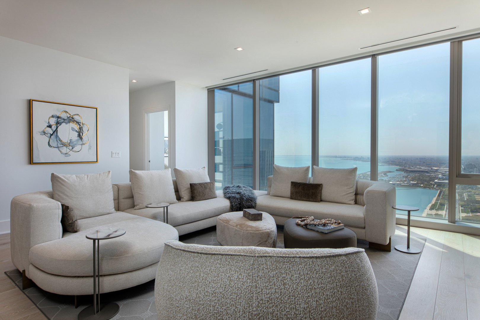 363 East Wacker Drive, Unit 6603 Chicago, IL 60601 - Photo 6 of 21 a living room with furniture and a large window