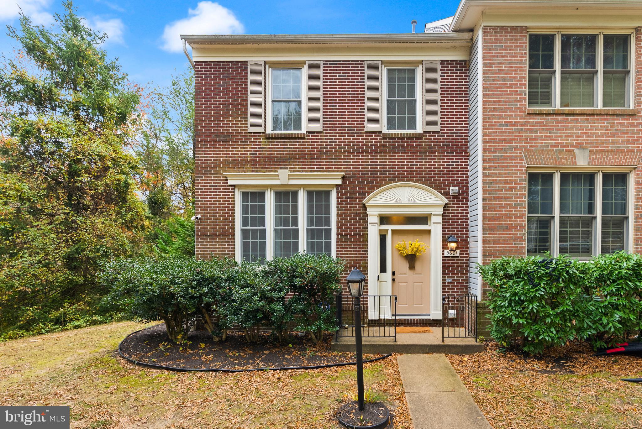 3601 Ransom Place Alexandria, VA 22306 - Photo 1 of 60 a front view of a house with a yard