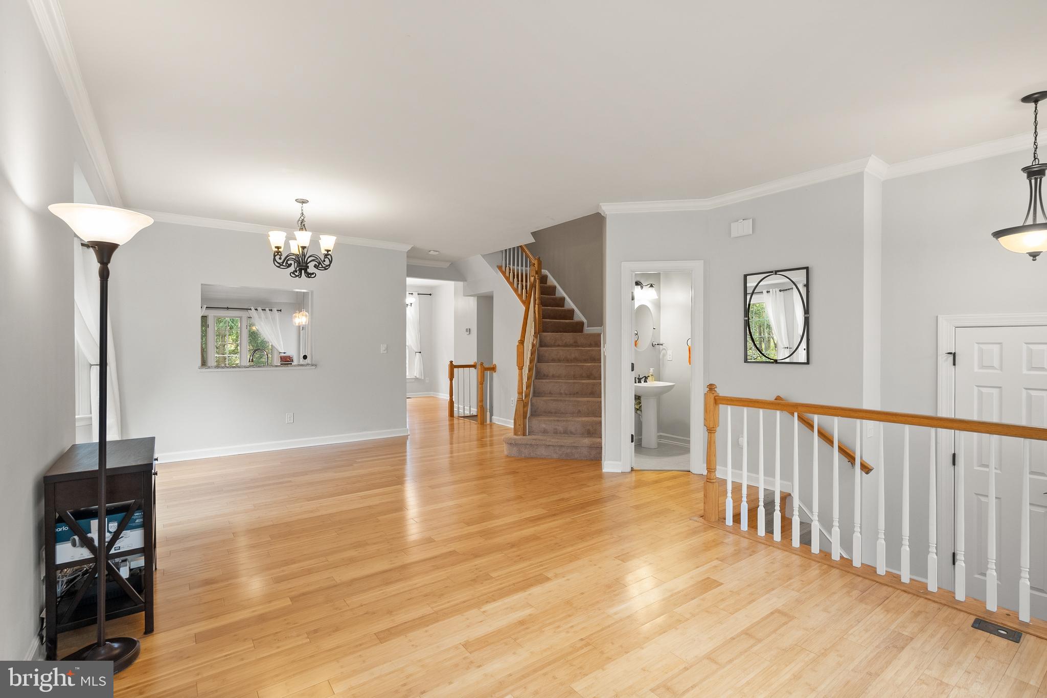 3601 Ransom Place Alexandria, VA 22306 - Photo 12 of 60 a view of a hallway with wooden floor and a living room