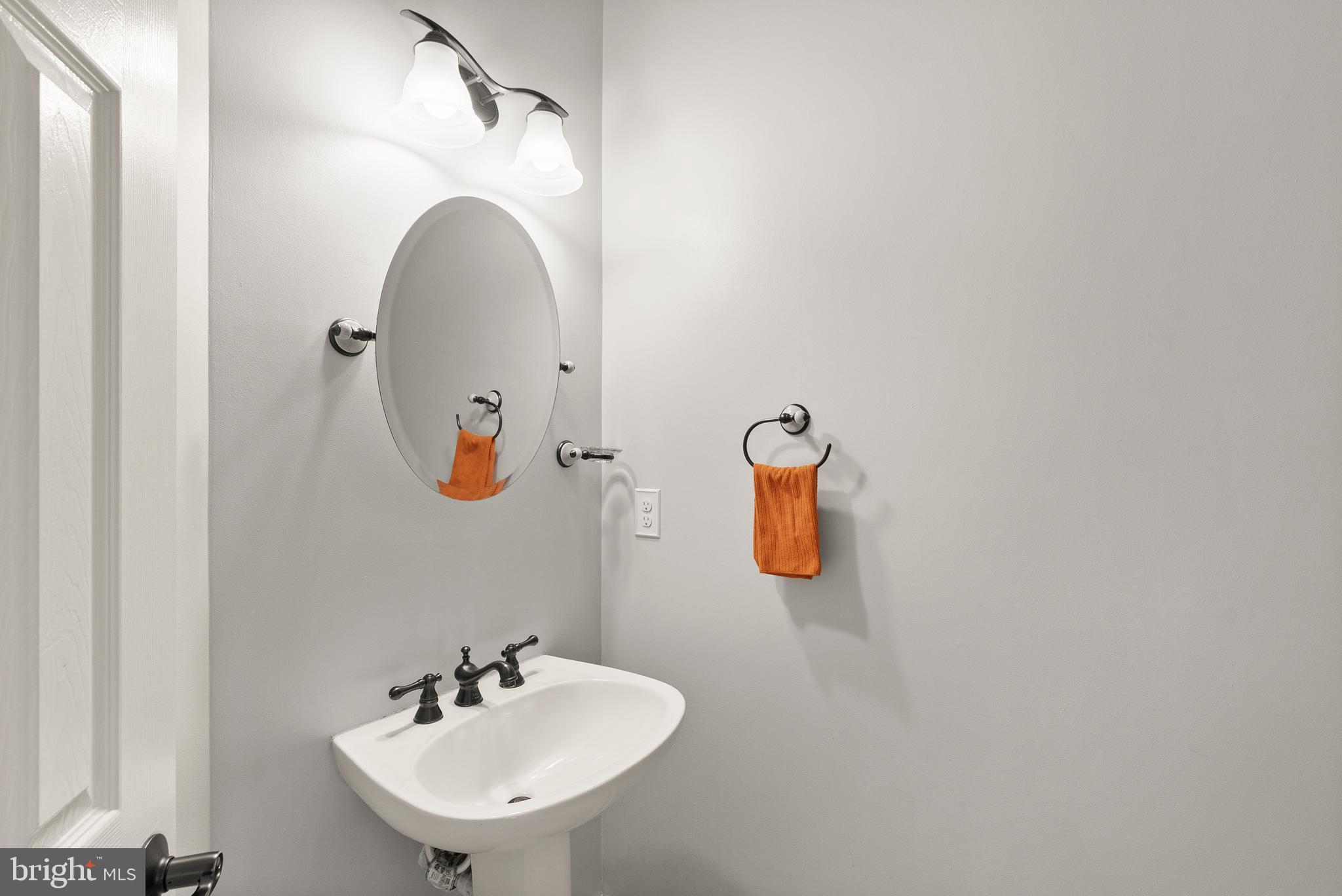 3601 Ransom Place Alexandria, VA 22306 - Photo 26 of 60 a bathroom with a sink and mirror