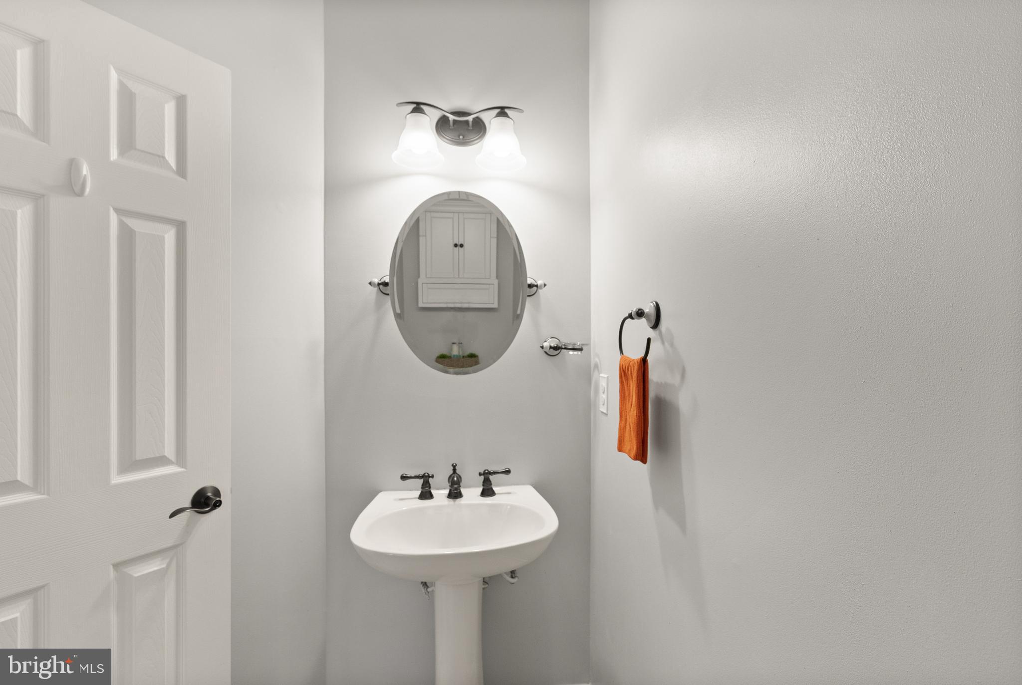 3601 Ransom Place Alexandria, VA 22306 - Photo 27 of 60 a bathroom with a sink and a mirror