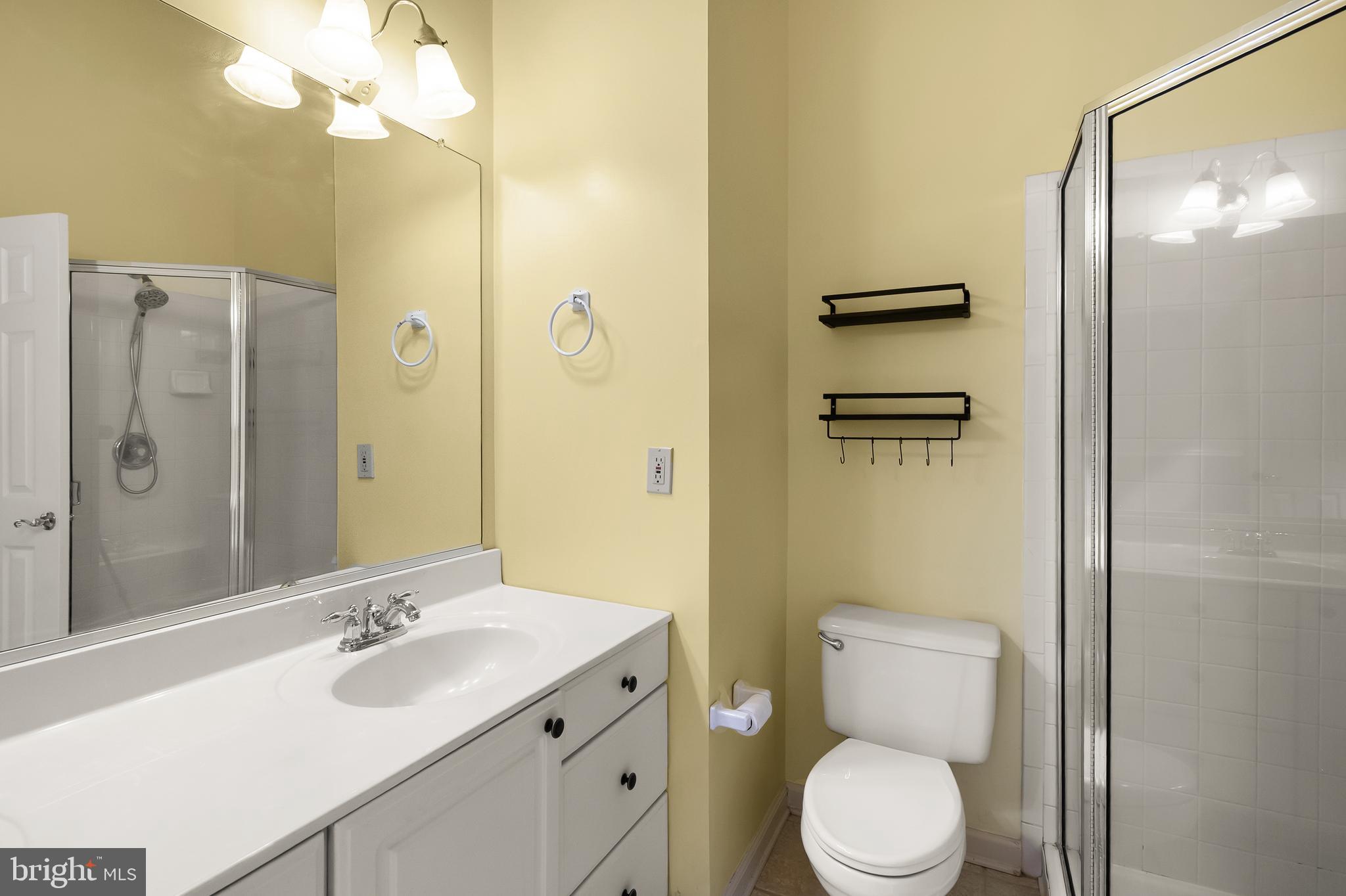 3601 Ransom Place Alexandria, VA 22306 - Photo 37 of 60 a bathroom with a sink a toilet and shower