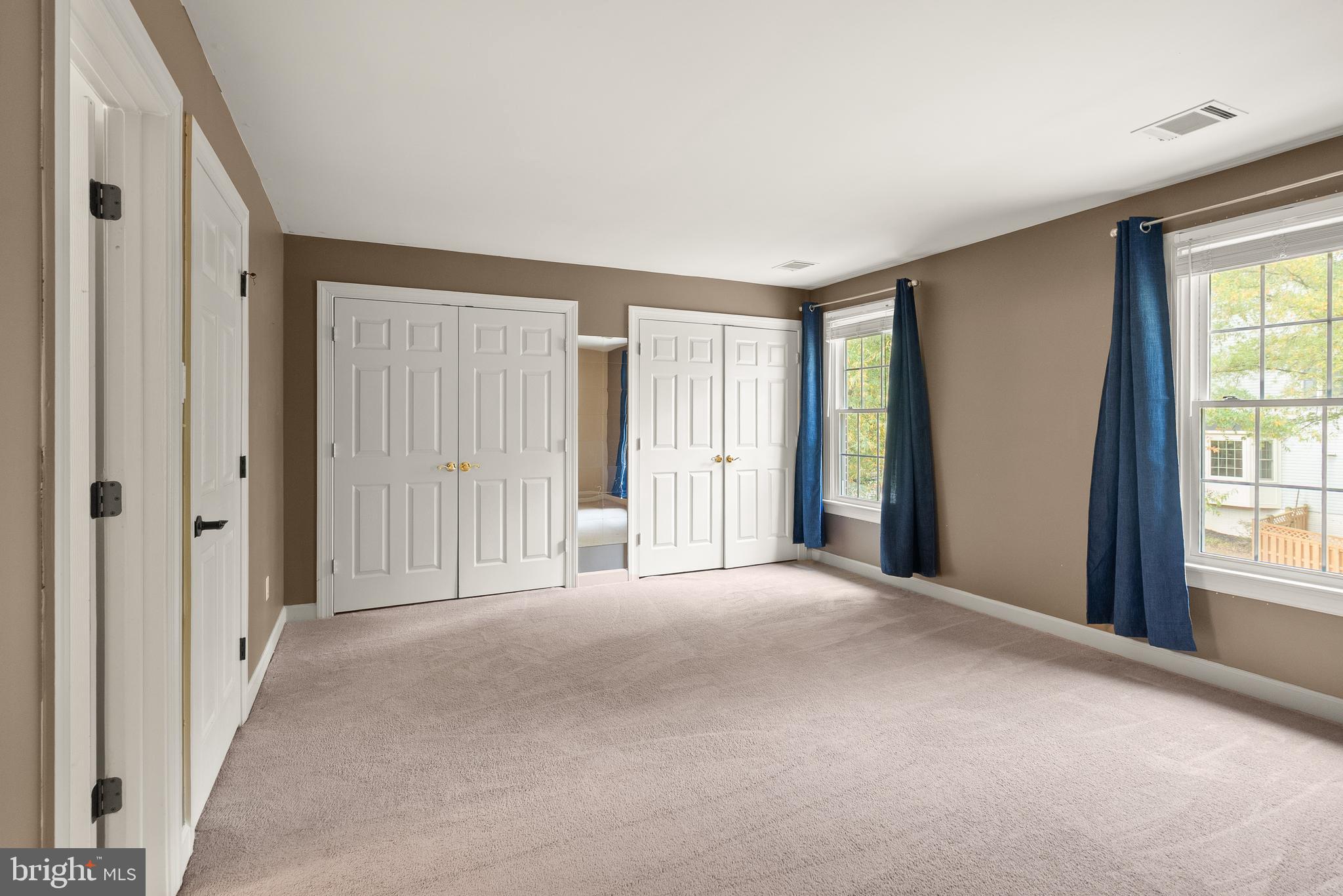 3601 Ransom Place Alexandria, VA 22306 - Photo 43 of 60 a view of an empty room with windows and closet area