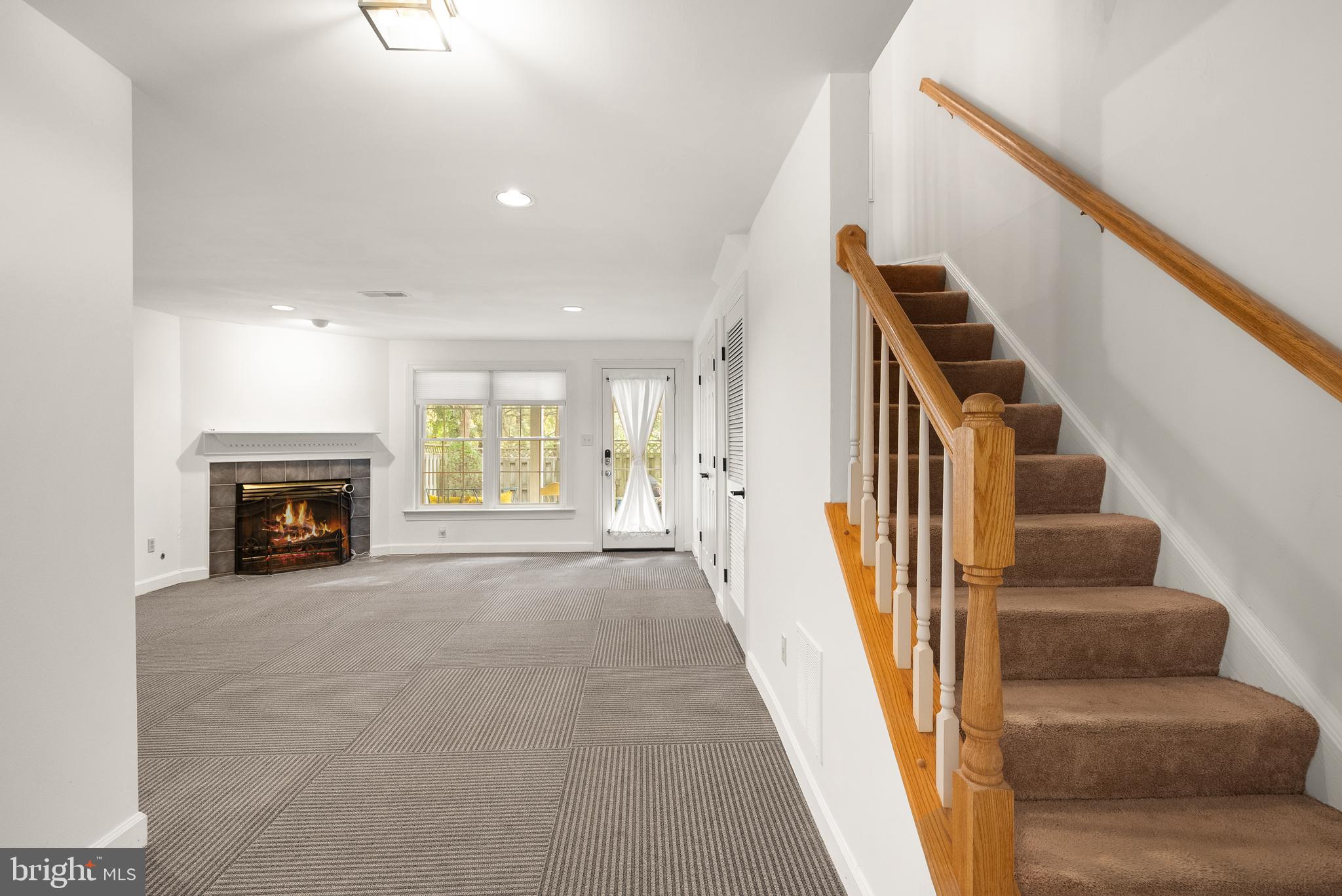 3601 Ransom Place Alexandria, VA 22306 - Photo 45 of 60 a view of a livingroom with wooden floor and fireplace