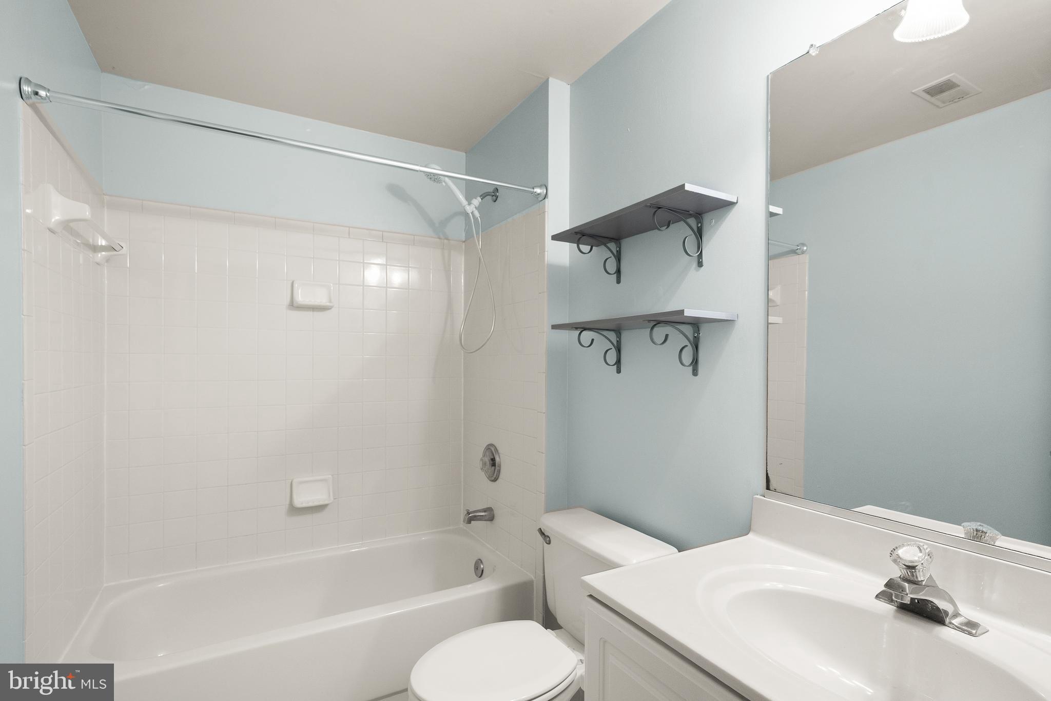 3601 Ransom Place Alexandria, VA 22306 - Photo 53 of 60 a bathroom with a sink toilet and shower