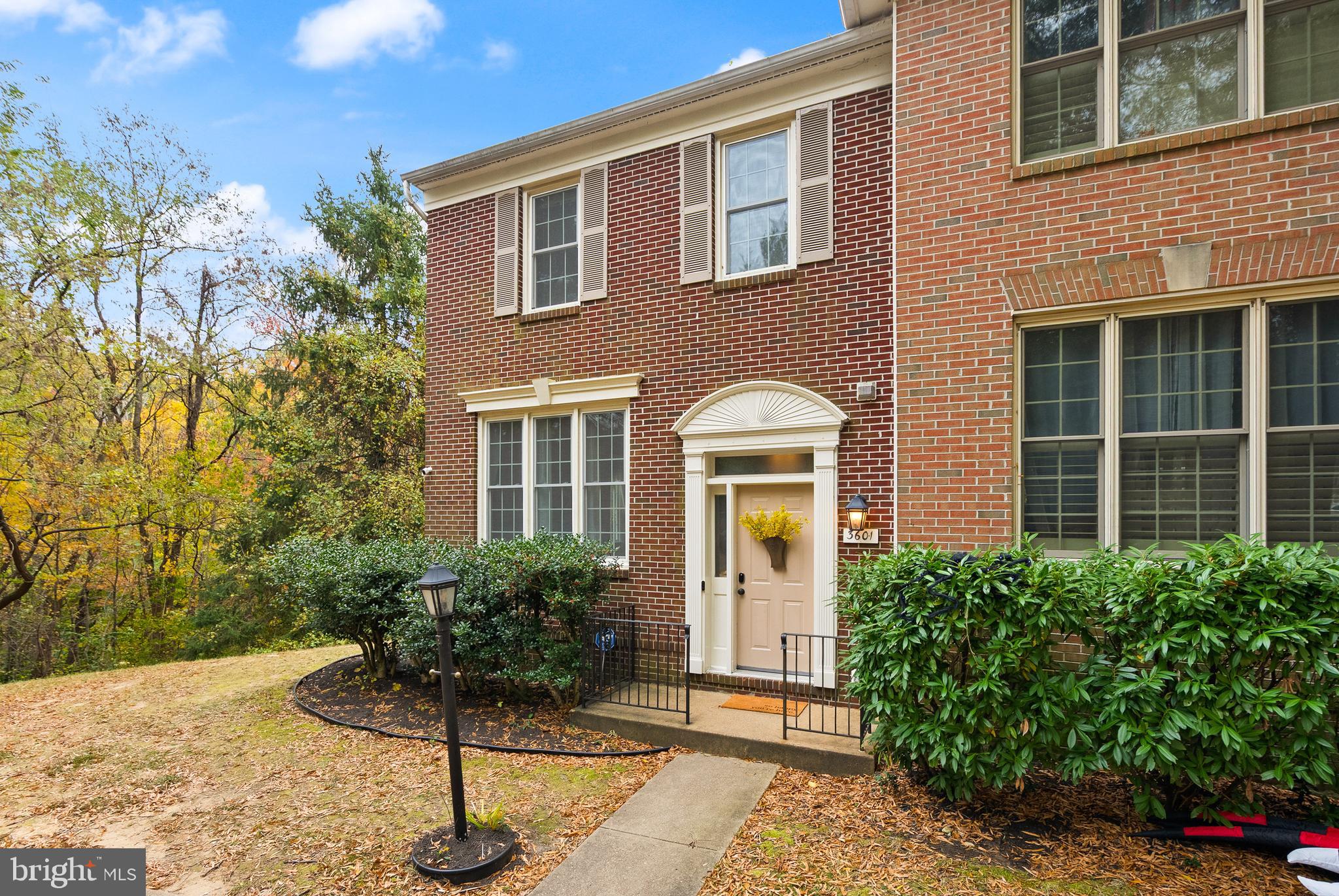3601 Ransom Place Alexandria, VA 22306 - Photo 7 of 60 a front view of a house with a yard