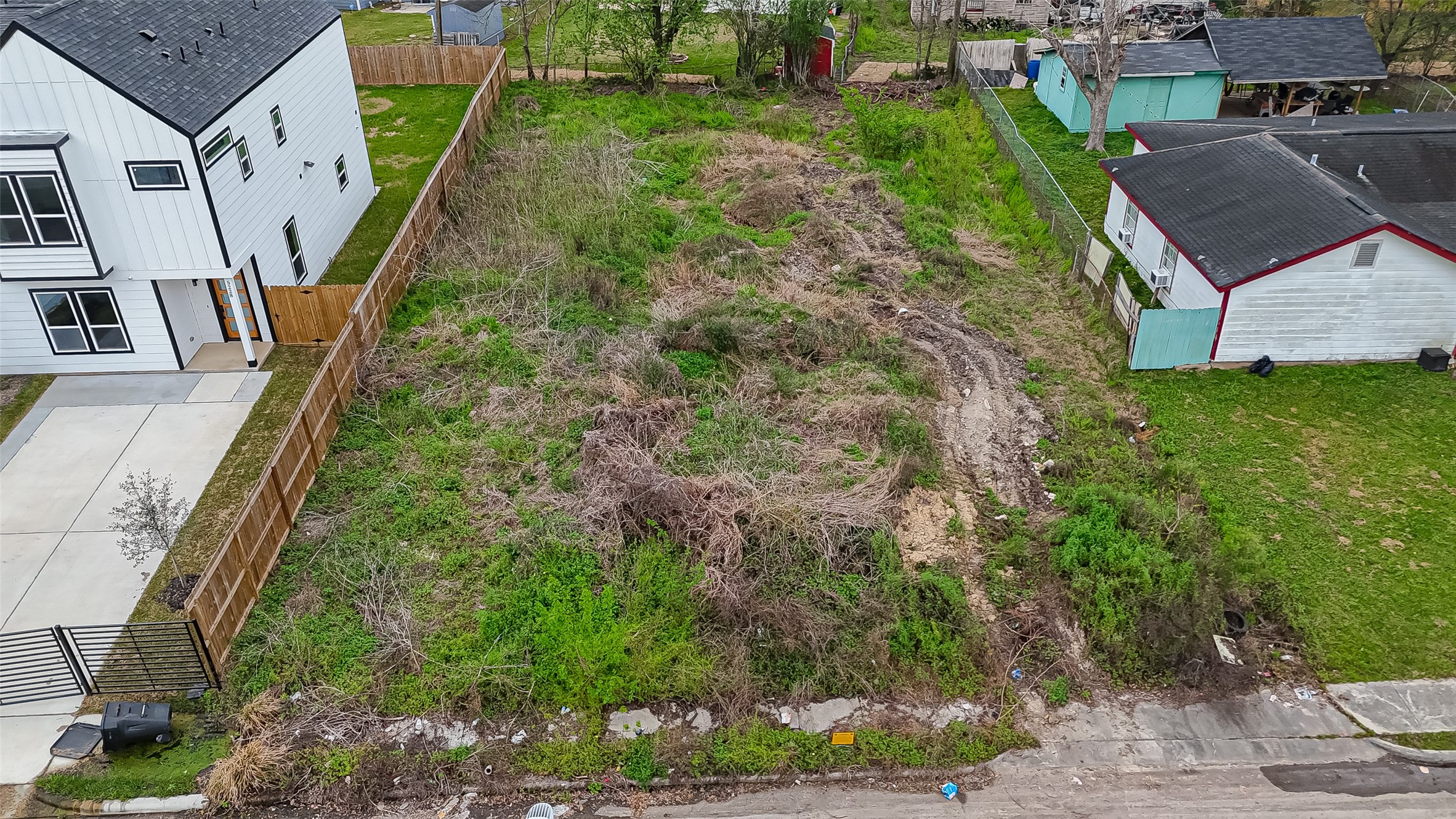 5224 Dewberry Street Houston, TX 77021 - Photo 1 of 9 aerial view of a house with a yard