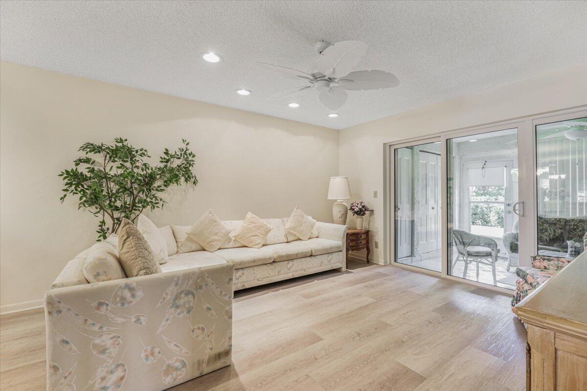5178 Privet Place, Unit D Delray Beach, FL 33484 - Photo 18 of 41 a living room with furniture and a large window
