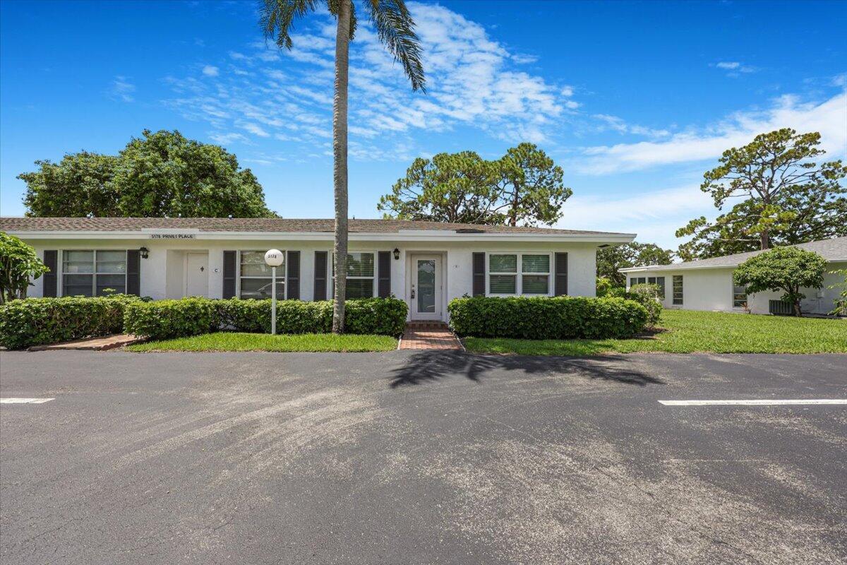 5178 Privet Place, Unit D Delray Beach, FL 33484 - Photo 3 of 41 a view of outdoor space yard and front view of a house