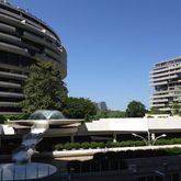 a view of a tall building from a balcony