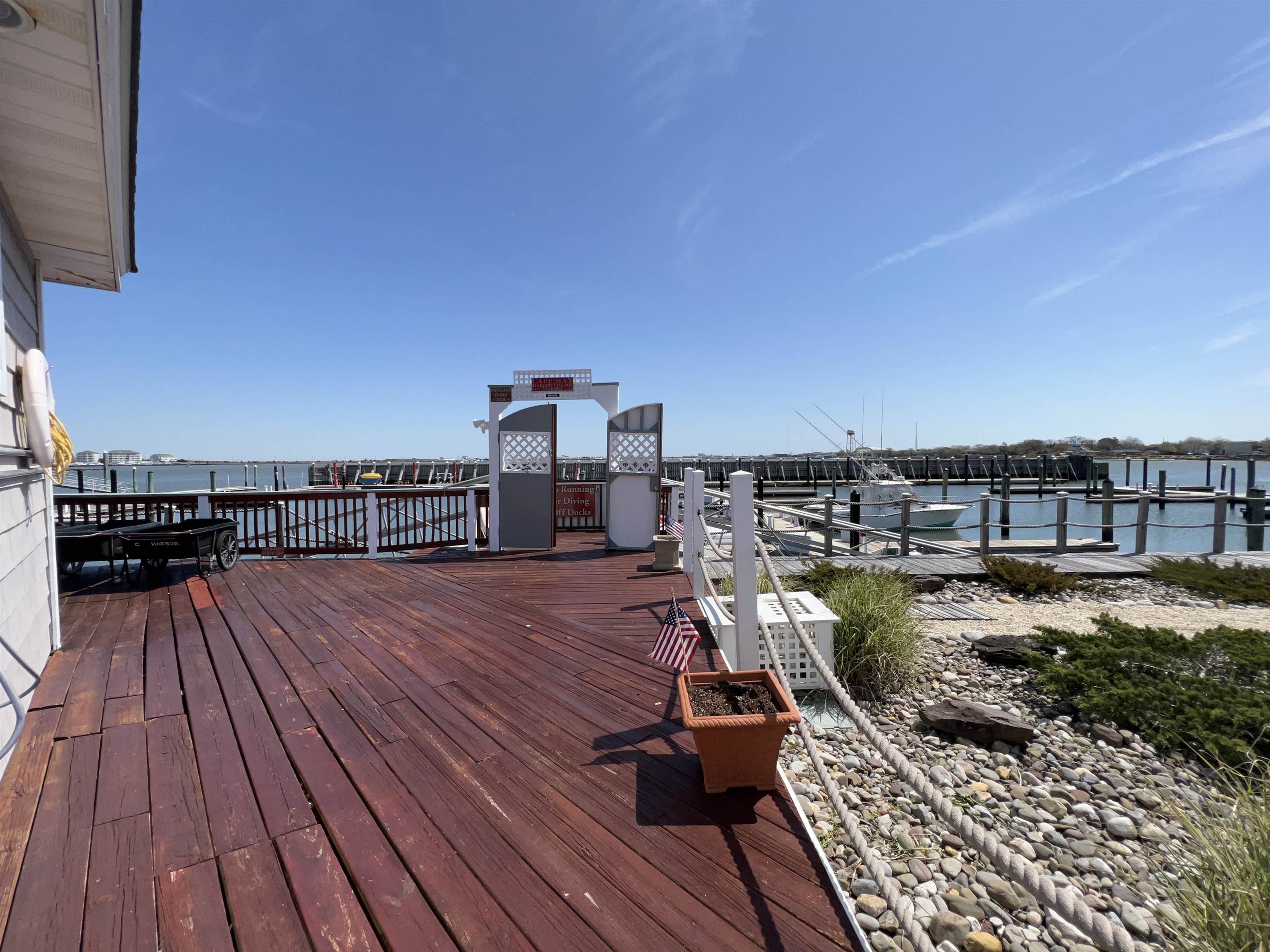 38 Harbor Lane Cape May, NJ 08204 - Photo 12 of 34 a view of a balcony with chairs