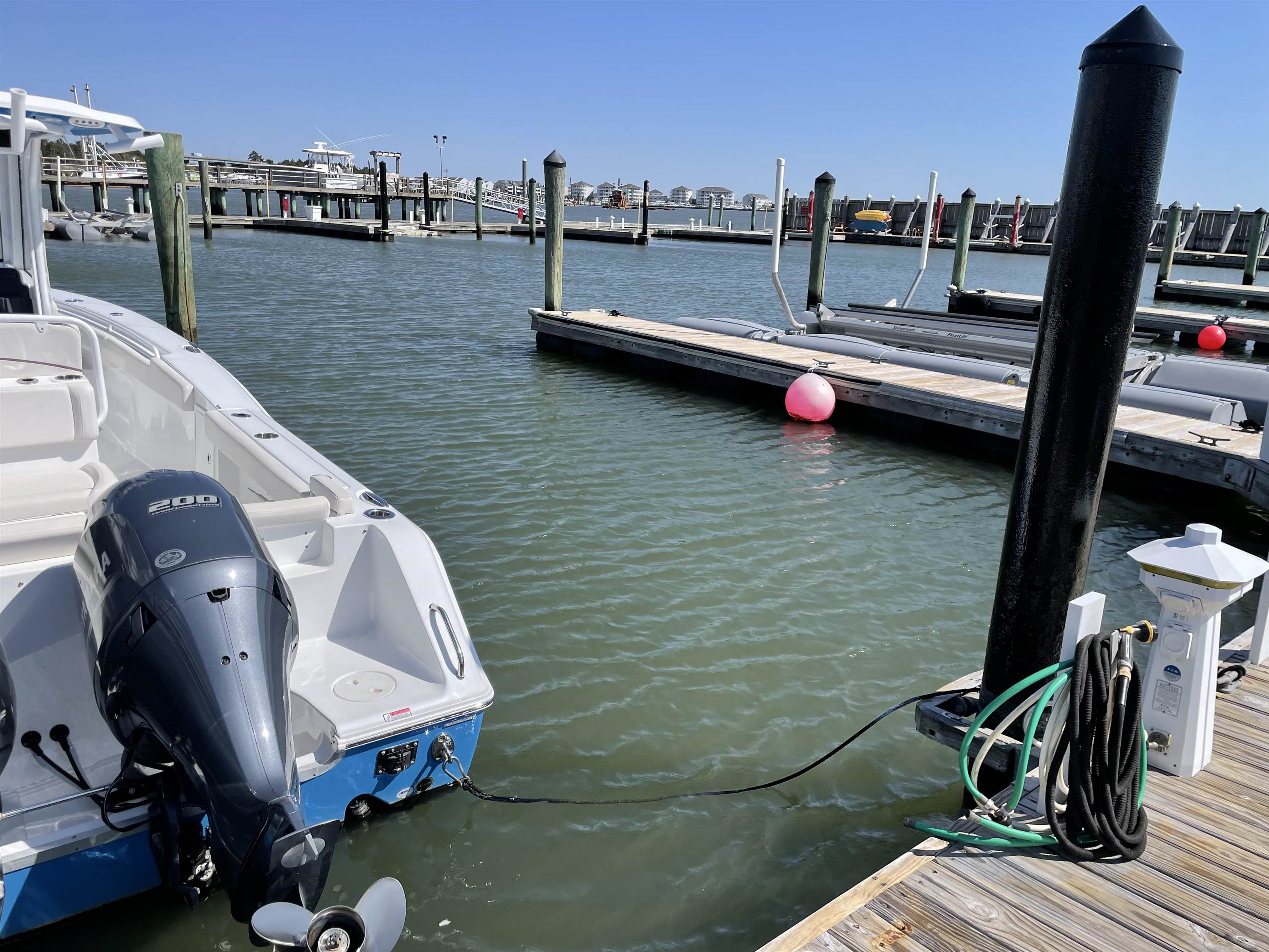 38 Harbor Lane Cape May, NJ 08204 - Photo 22 of 34 a view of roof deck with dining table and chairs