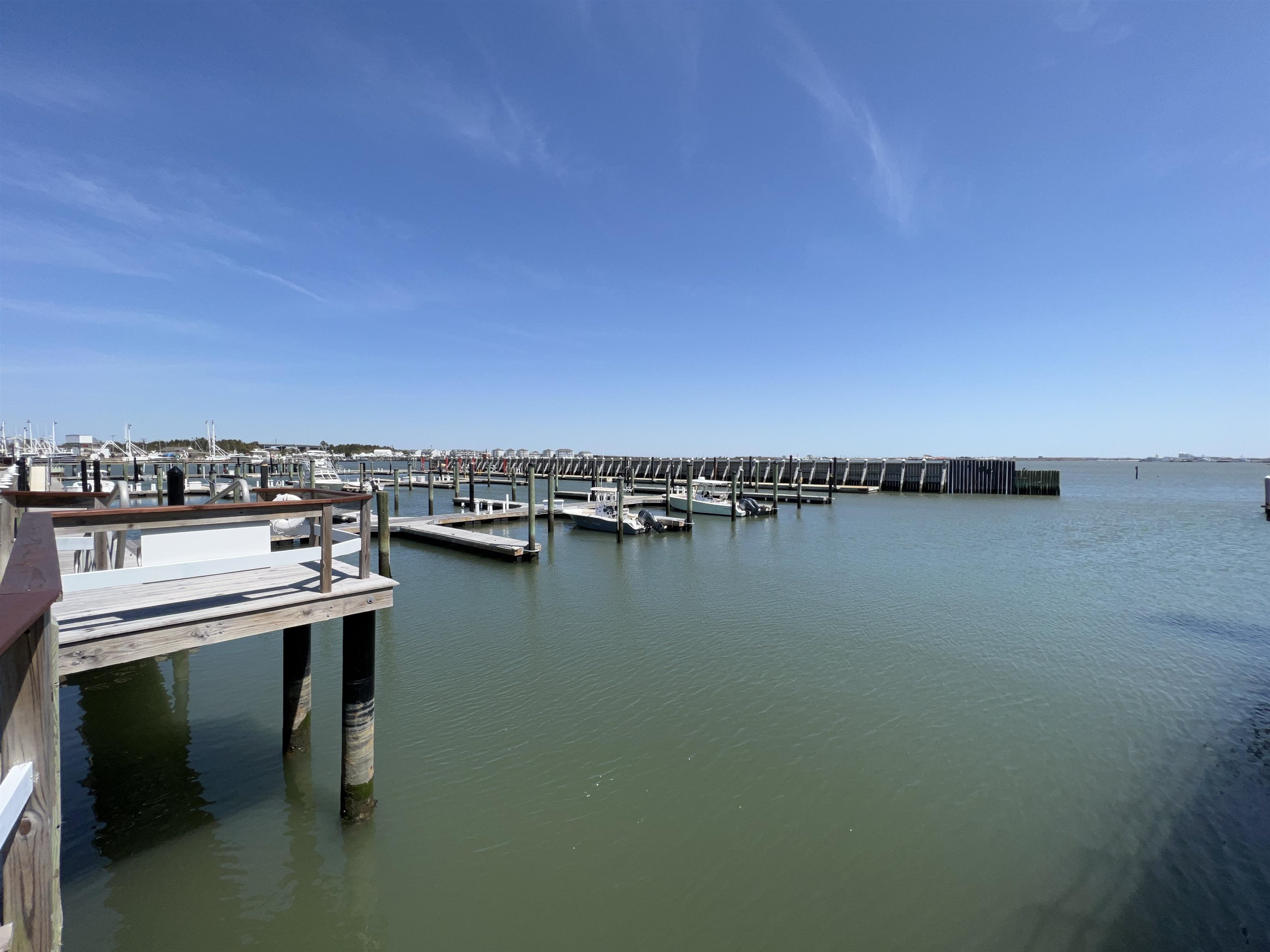 38 Harbor Lane Cape May, NJ 08204 - Photo 29 of 34 a view of a water with a table and chairs