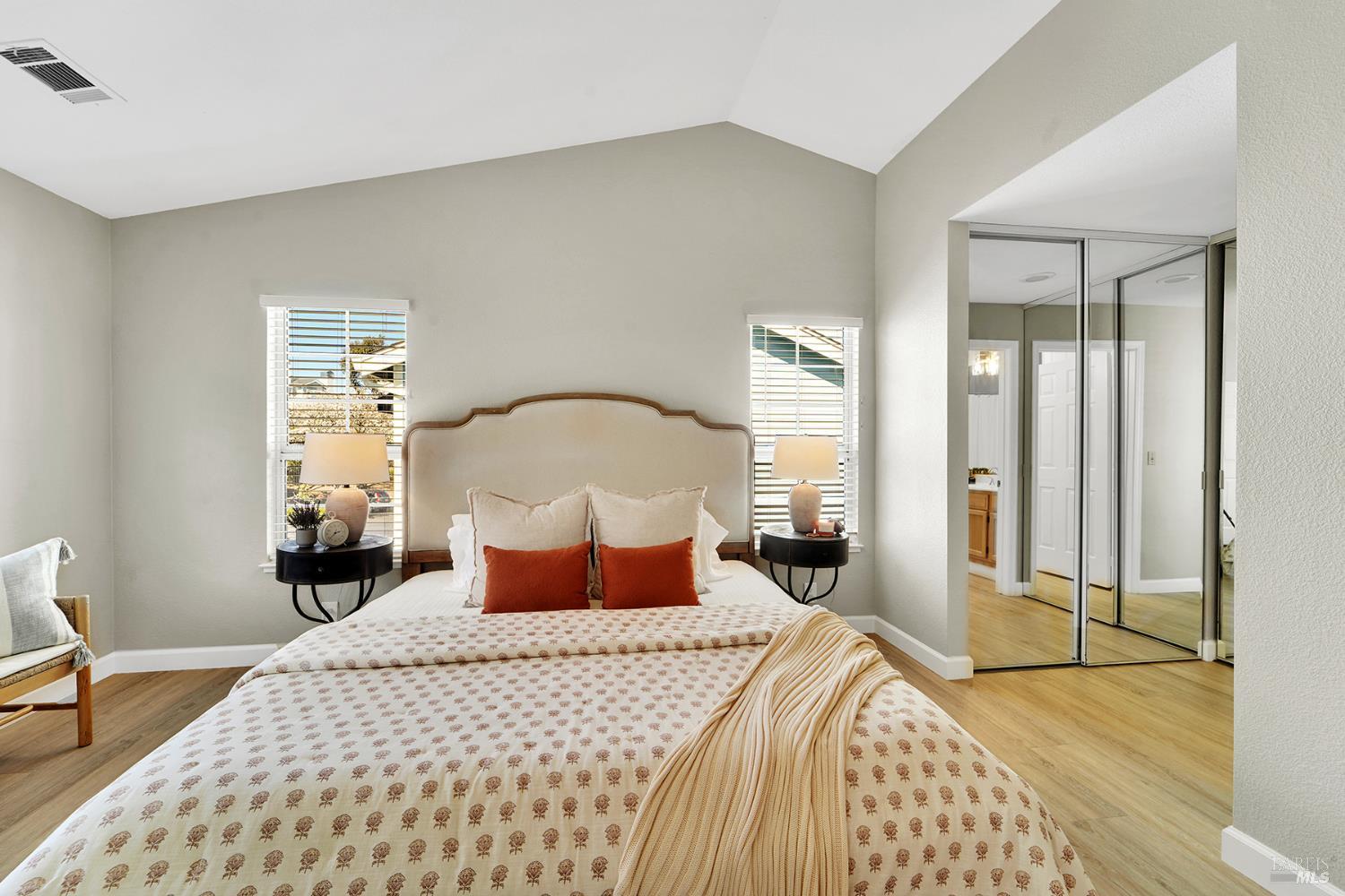 511 Timbercove Street, Unit 8 Vallejo, CA 94591 - Photo 21 of 34 a bedroom with a bed and a large mirror