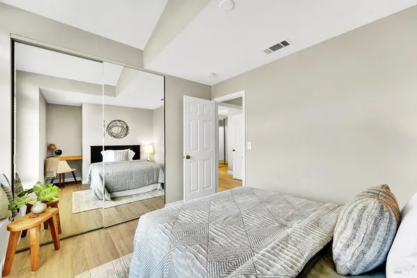 a bathroom with a sink double vanity and a mirror
