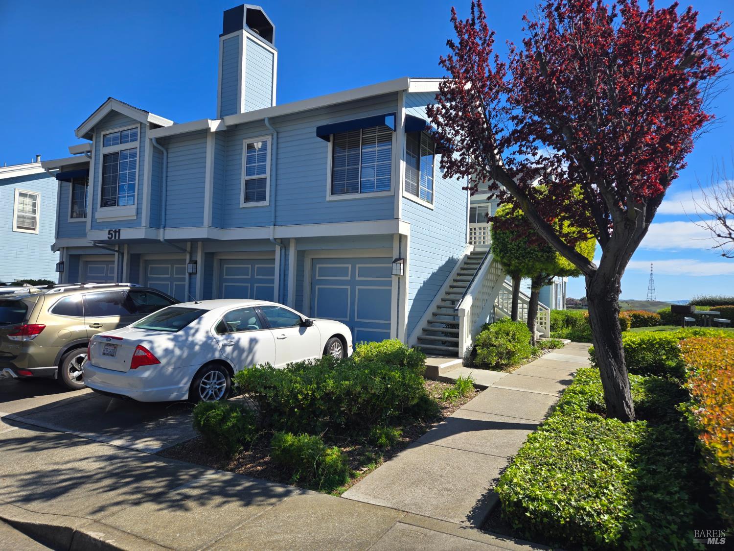 511 Timbercove Street, Unit 8 Vallejo, CA 94591 - Photo 7 of 34 a front view of a house with a yard