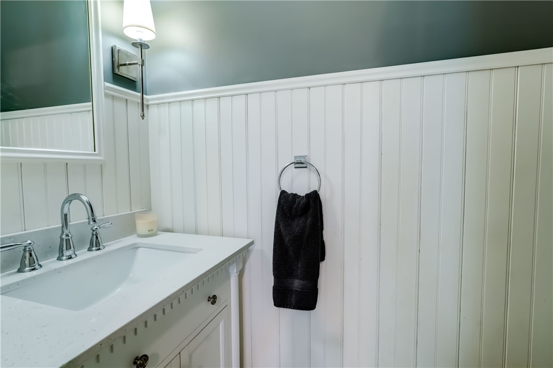 5 Hadley Drive Perinton, NY 14450 - Photo 18 of 50 Rear hall powder room off the garage with bead-boa