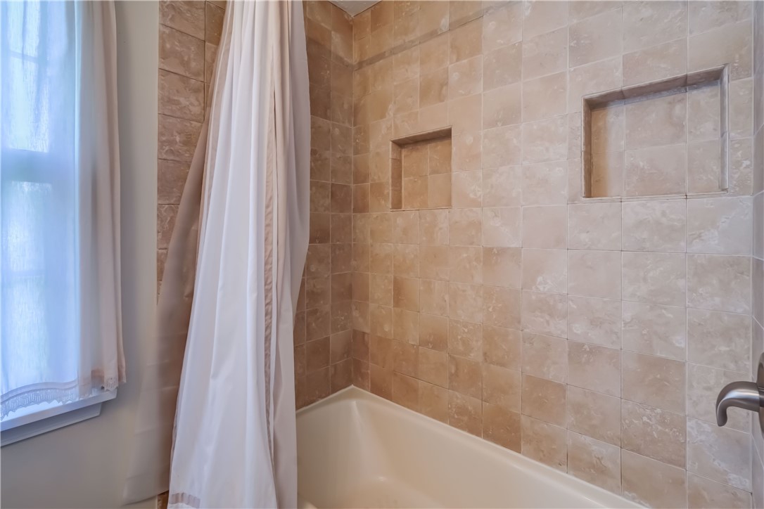 5 Hadley Drive Perinton, NY 14450 - Photo 30 of 50 View of the newer tiled bath surround in the famil