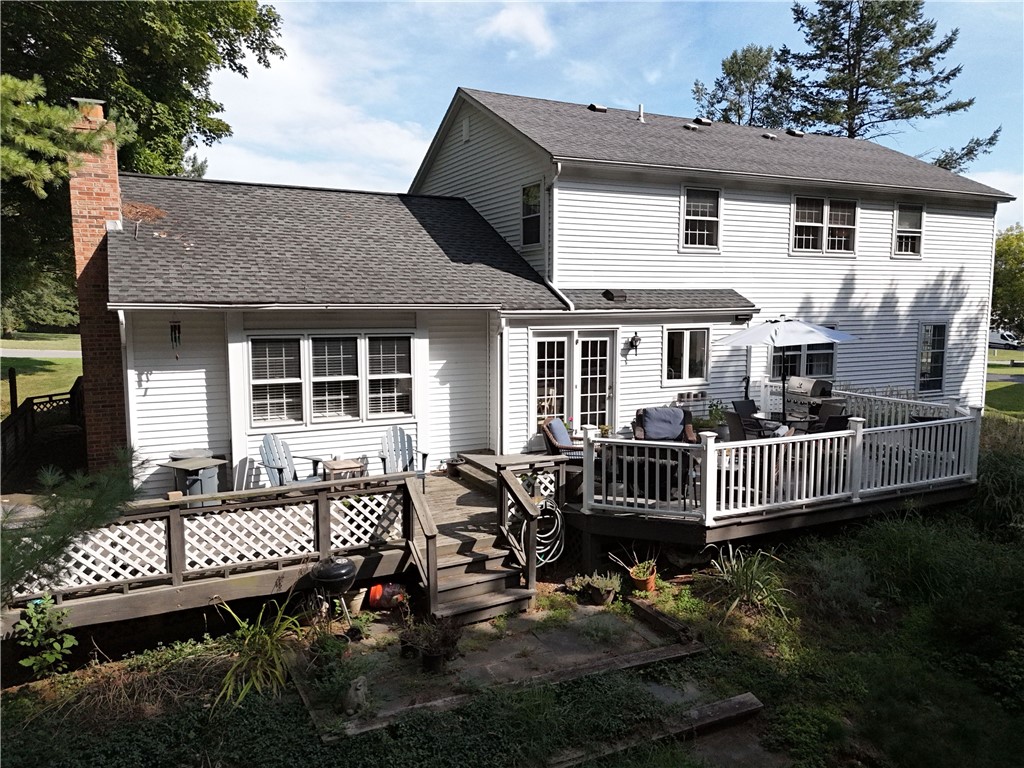 5 Hadley Drive Perinton, NY 14450 - Photo 39 of 50 Traditional goodness in a rear elevation with a de