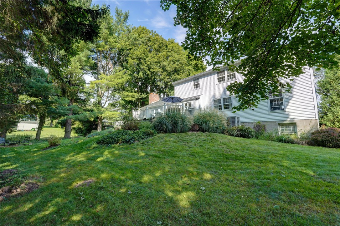 5 Hadley Drive Perinton, NY 14450 - Photo 41 of 50 View looking up to the home near the rear corner p