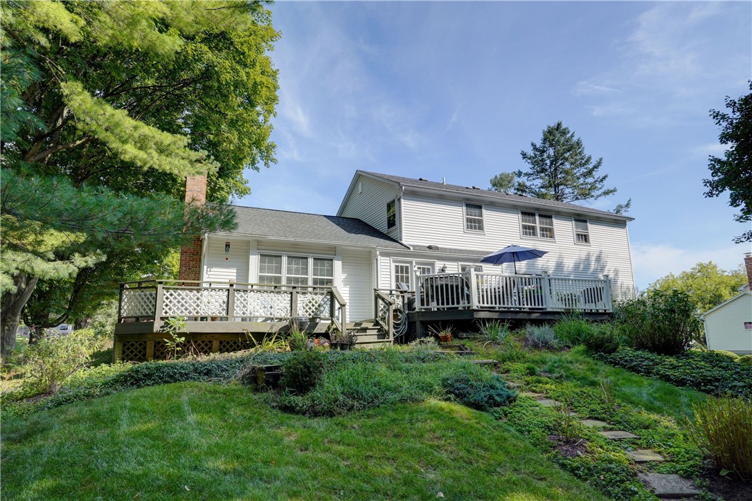 5 Hadley Drive Perinton, NY 14450 - Photo 42 of 50 From the fire pit looking up to the deck...a priva