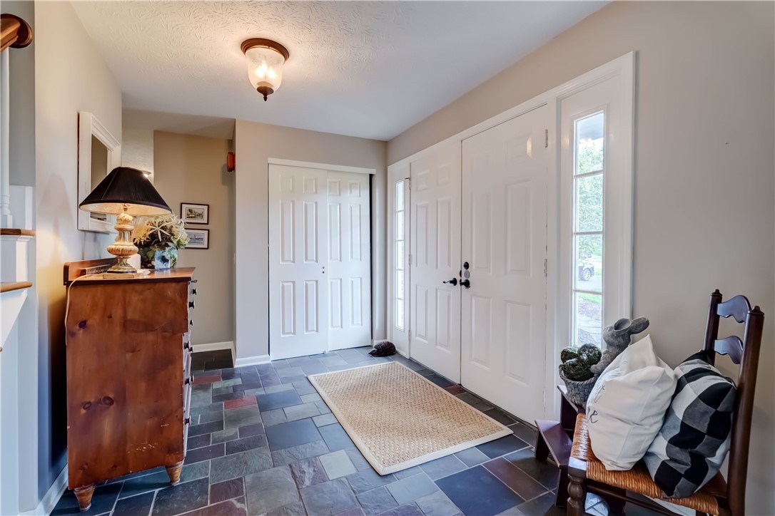 5 Hadley Drive Perinton, NY 14450 - Photo 5 of 50 Alternate view of the double-door entry foyer with