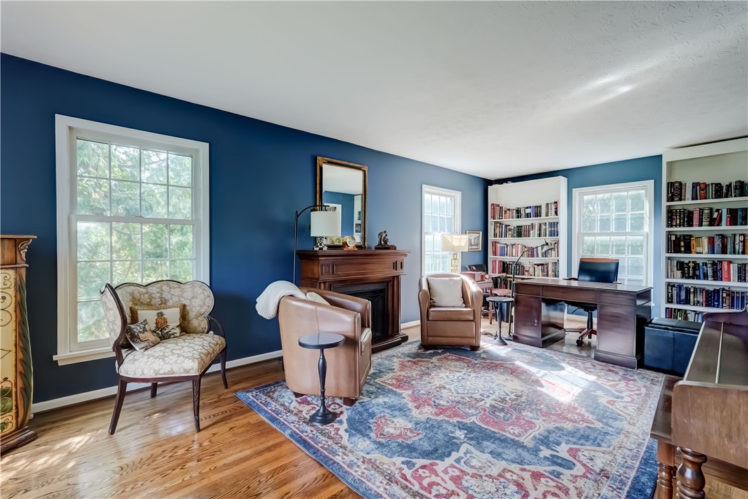 5 Hadley Drive Perinton, NY 14450 - Photo 6 of 50 Generous living room/office with tasteful hardwood