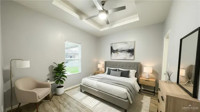 a bedroom with a bed and a couch