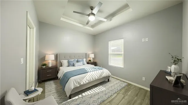 a bedroom with a bed and a couch