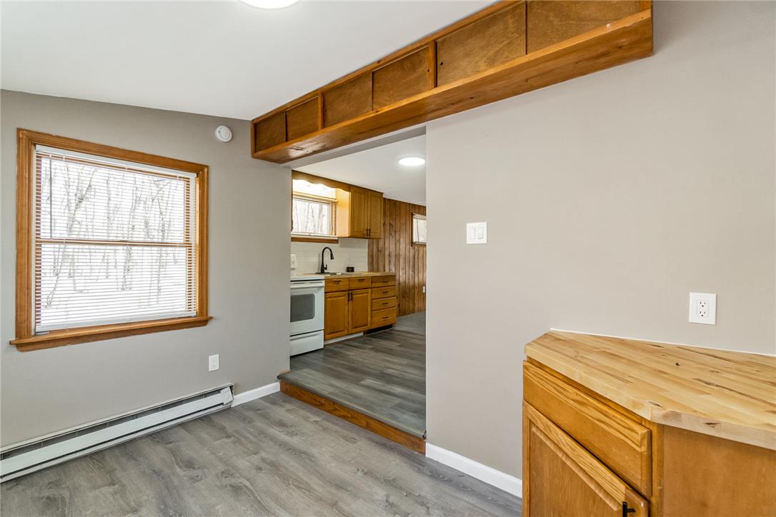 121 Short Ridge Road Albrightsville, PA 18210 - Photo 23 of 35 An open doorway connects the versatile dining area to the adjacent kitchen.