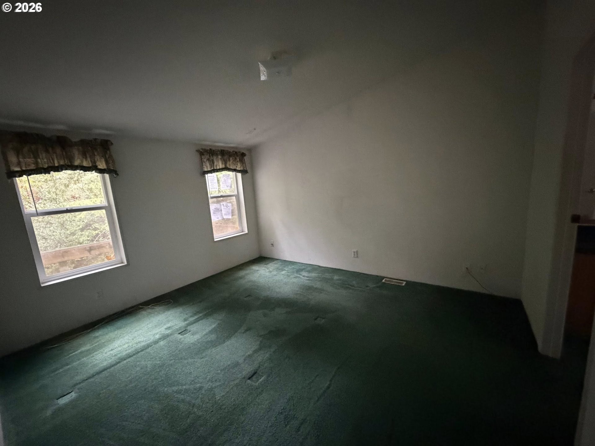 61528 Edwards Mill Road Coos Bay, OR 97420 - Photo 16 of 20 an empty room with windows