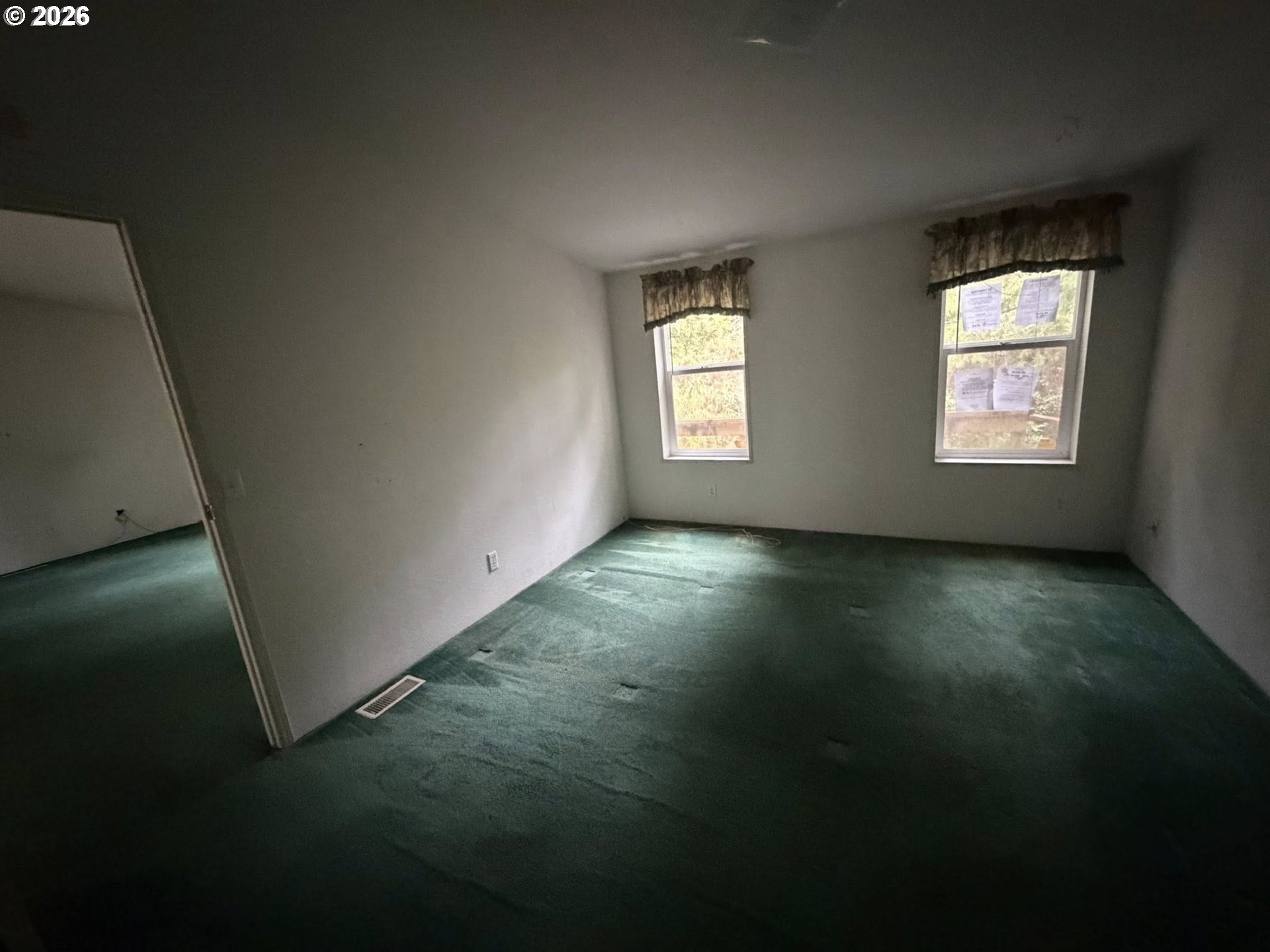 61528 Edwards Mill Road Coos Bay, OR 97420 - Photo 8 of 20 a view of room and hall with wooden floor