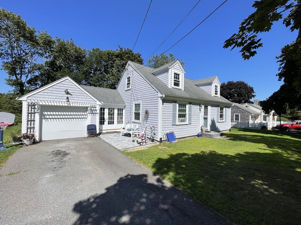 front view of a house with a big yard