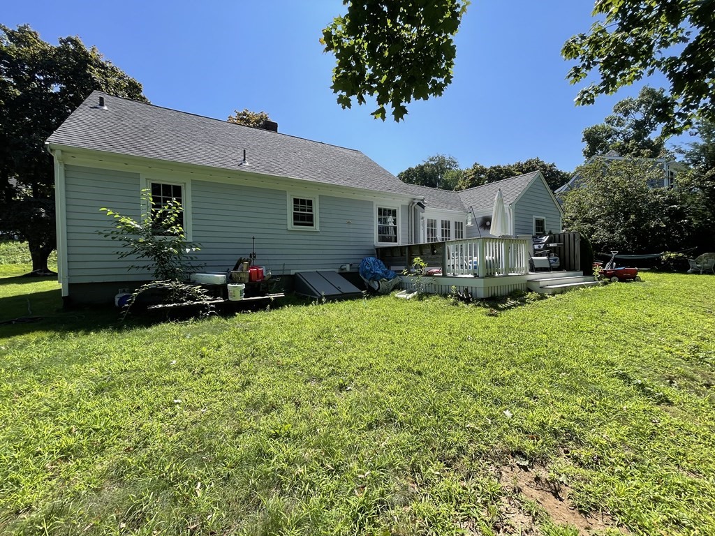 4 Riverside Drive Kingston, MA 02364 - Photo 4 of 9 a view of a house with a backyard