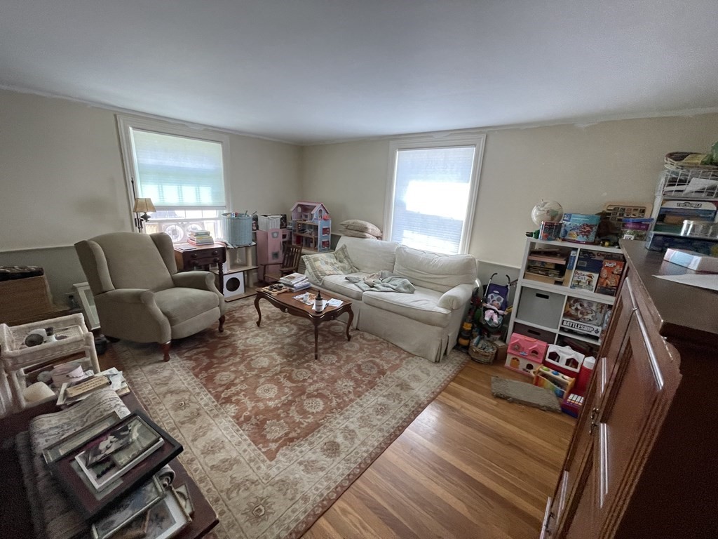 4 Riverside Drive Kingston, MA 02364 - Photo 9 of 9 a living room with furniture and a window