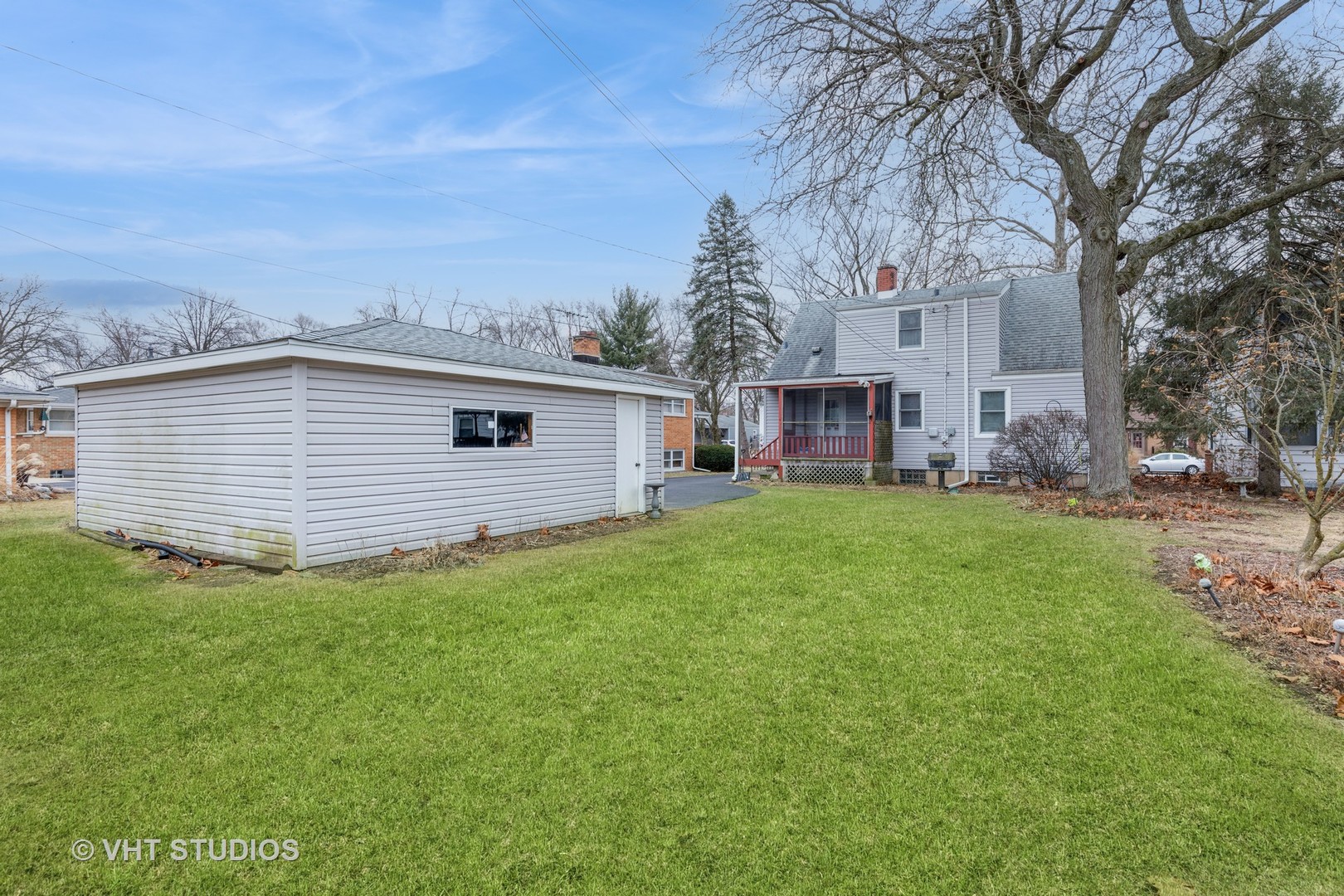 1132 Hickory Road Homewood, IL 60430 - Photo 20 of 20 a view of a backyard with plants and large tree