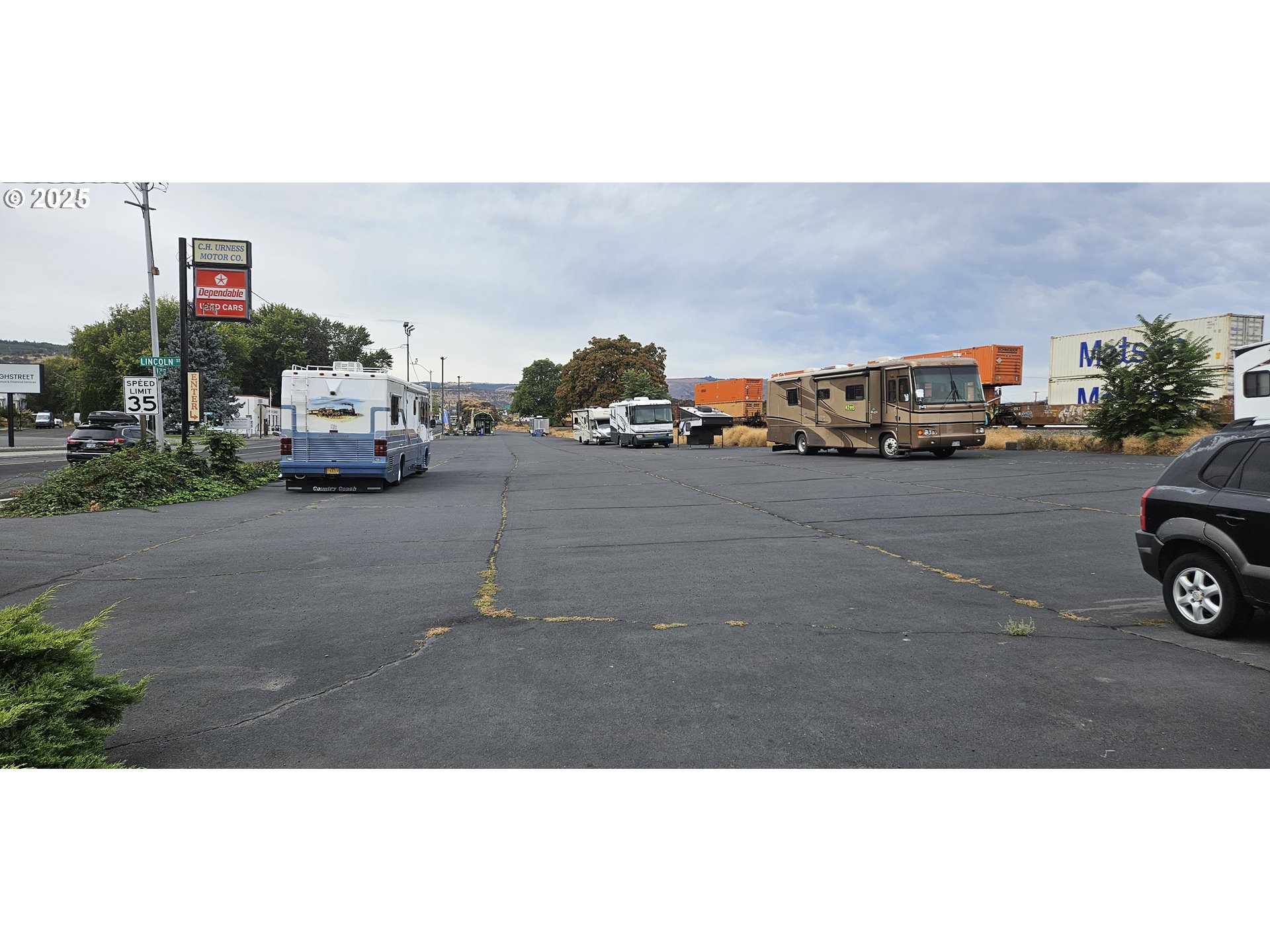 West 2nd Street The Dalles, OR 97058 - Photo 6 of 8 a car parked on the side of the road