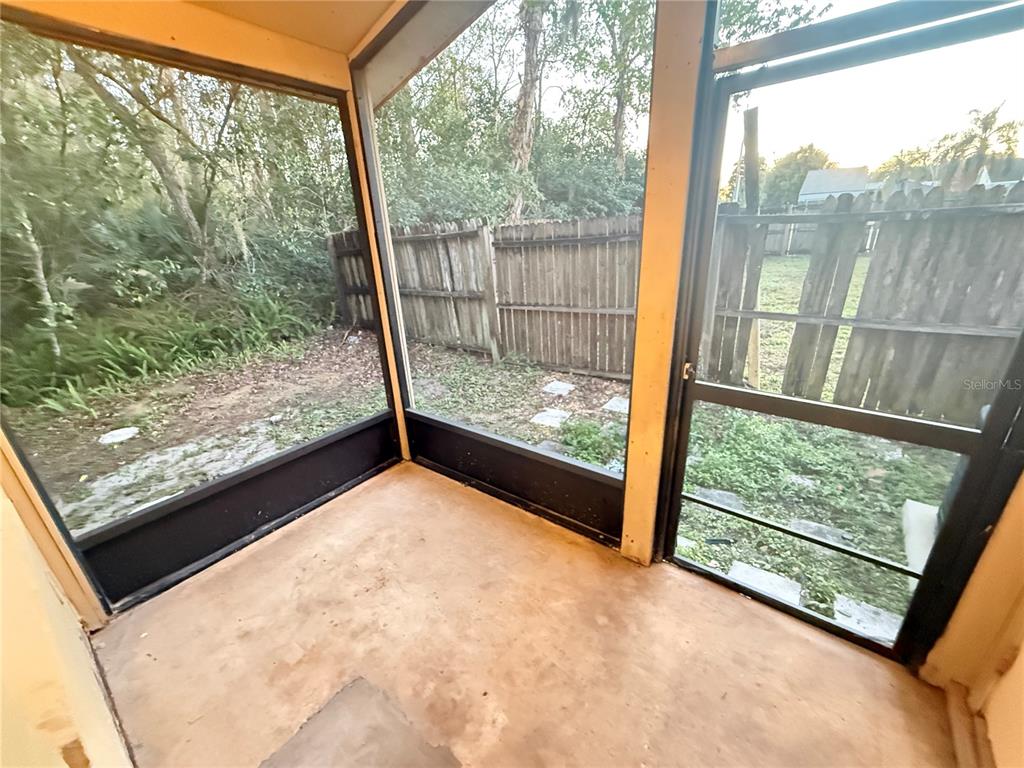 209 South Moss Road, Unit 209 Winter Springs, FL 32708 - Photo 10 of 14 a view of a garden from a window