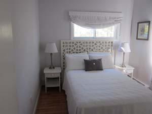 140 Fox Island Road Wellfleet, MA 02667 - Photo 11 of 23 a bedroom with a bed and a window