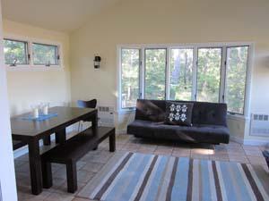 140 Fox Island Road Wellfleet, MA 02667 - Photo 15 of 23 a living room with furniture and a window