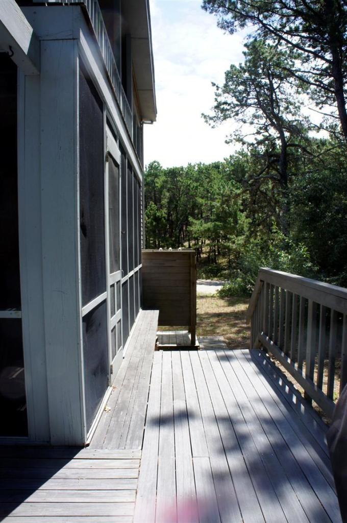 140 Fox Island Road Wellfleet, MA 02667 - Photo 16 of 23 a view of balcony and wooden floor